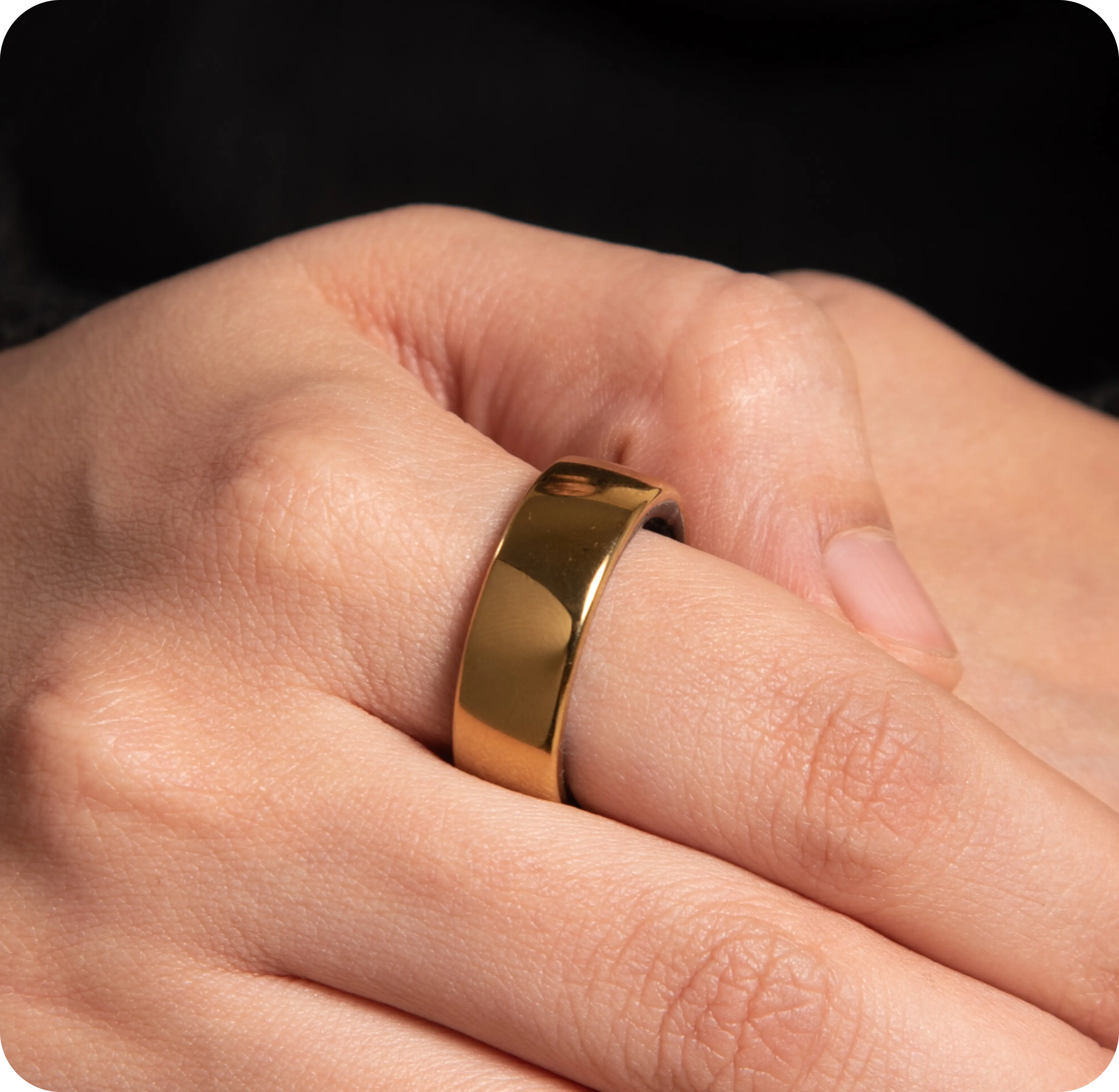 image of arm with gold ring